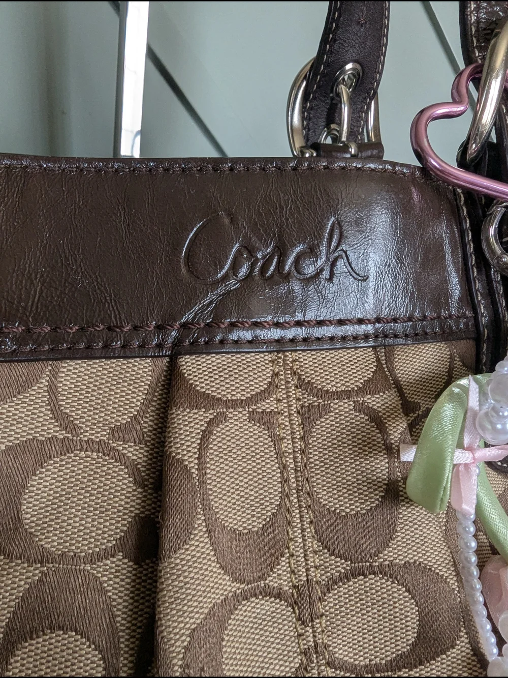 Coach material signature